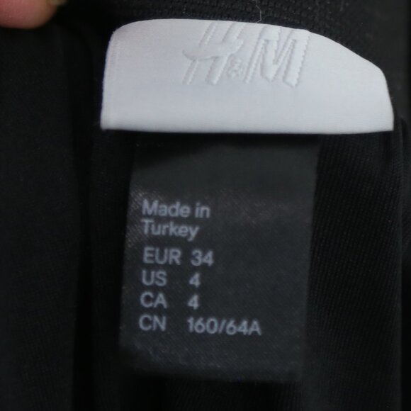 H&M High-Waisted Voluminous Ruffle Detailed Black Mini Elastic Skirt Size 4 - Picture 3 of 6